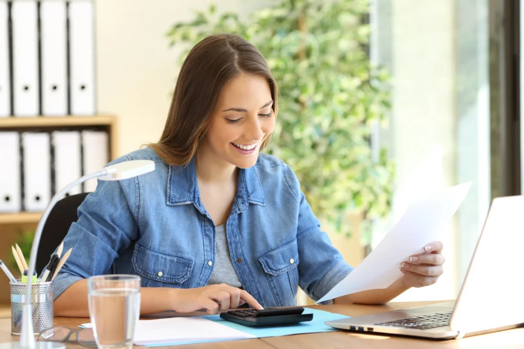 young woman feeling happy about expense tracking